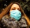 Virus protect in quarantine. Beautiful girl with mask