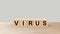 Virus - word wooden cubes on table horizontal over gray background HD, corona virus, infected wood, hacker attack online, pandemic