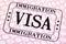 Visa document immigration stamp passport page closeup