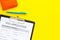 Visa prosessing. Registration of visas. Visa application form and pen on yellow background top view copy space