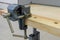 Vise attached to the workbench. Workplace of a carpenter. Close-up. School or home workshop