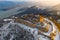 Visegrad, Hungary - Aerial view of the beautiful snowy high castle of Visegrad at sunrise with Dunakanyar