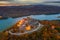 Visegrad, Hungary - Autumn from above at Visegrad. Aerial drone view of the beautiful high castle of Visegrad with colorful sunset