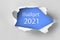 Vision 2021 goal written behind a torn paper. Top view of white torn paper and the text `2021` on a red background