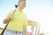 Visions of improving his handicap. Low angle shot of a handsome older golfer standing in front of a golf cart with his