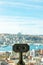 Visit Istanbul concept vertical photo. Binoculars and Istanbul view