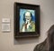 Visitor looking at painting of Pablo Picasso in National gallery in London