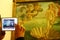 Visitor photographs the Birth of Venus in Uffizi