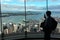 Visitor take photo with his mobile phone from Aucklands Sky Tow