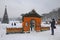 A visitor takes pictures near the `Chinese Castle`, created from fruits