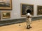 Visitor at Tate Britain art museum on Millbank in the City of Westminster in London