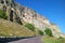 Visitor on the Trail Climbing onto Vardzia, Amazing Medieval Cave City Dug out of the Erusheti Mountain in Southern Georgia