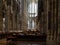 Visitors in church service in Cologne Cathedral