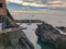 Visitors on the cliff walks and boats in the sea at Riomaggiore, Cinque Terre, Italy