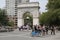 Visitors enjoy sunny day at Washington Square in Lower Manhattan