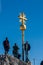 Visitors at the Golden summit cross, the peak of Germany and Wetterstein Mountains, Zugspitze, Bavaria, Germany