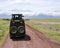 Visitors on jeep pictures of wild animals in Ngorongoro Crater