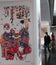 Visitors are looking China\'s traditional New Year paintings on a exhibition in the National Library of China