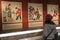 Visitors are looking China\'s traditional New Year paintings on a exhibition in the National Library of China