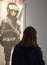 Visitors observe Banksy`s street works in an unauthorized exhibition in a museum