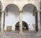 Visitors at Palace of Weathervanes Courtyard, Caceres, Spain