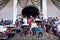 Visitors at the stairs of Saint James the Apostle church watching the event for good Friday in Semana Santa, Easter, Santiago