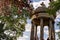 Visitors at the temple of the Sybil in Buttes Chaumont Park, Paris