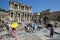Visitors to Ephesus near Selcuk in Turkey crowd around the ruins of the Library of Celsus.