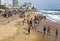 Visitors to Galle Face Green enjoy a sunny afternoon along the Indian Ocean in Sri Lanka.