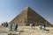 Visitors to Giza gather around the base of the Pyramid of Khafre in Cairo, Egypt.