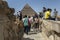 Visitors to Giza view the Pyramid of Khufu in Cairo, Egypt.