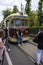 Visitors to the Moscow tram exhibition are photographed near the retro RVZ car