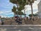 Visitors to Rome sit on steps at Trajan`s Forum