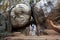 Visitors to Sigiriya Rock in Sri Lanka walk through Boulder Arch Number One.