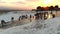 Visitors and Tourist People Walks Pamukkale`s Calcium Carbonate Travertines at Sunset