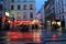 Visitors walking in the dusk and rain through the streets of Paris,France,2016