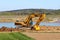 Vislock river, Poland - may 2, 2018:A dump truck is loaded with soil. Land works in the quarry of river gravel. Extraction of natu