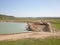 Vislock river, Poland - may 2, 2018:The excavator loads the dump truck with soil.Land works in the quarry of river gravel. Extract