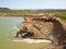 Vislock river, Poland - may 2, 2018:The excavator loads the dump truck with soil.Land works in the quarry of river gravel. Extract