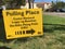 Vista, CA USA - September 13, 2021: A multilingual sign shows the way to polling place in California recall election