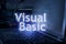 Visual Basic inscription against laptop and code background. Learn programming language, computer courses, training