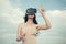 Visual reality concept. Digital future innovation. Woman with glasses of virtual reality. Girl using VR headset. Woman