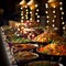 Visually Stunning Reception Buffet Setup with Multiple Food Stations