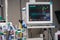 Vital signs monitor with machines during surgery