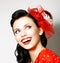 Vitality. Cheerful Young Woman with Red Bow enjoying. Pleasure