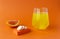 Vitamin C effervescent tablet, water soluble with orange flavor.