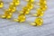 Vitamin capsules on wooden background