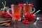 Vitamin healthy viburnum berry warm drink in glass cups with fresh raw viburnum berries and cinnamon sticks, anise stars