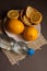 Vitamin lemons on grey background