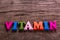 Vitamin word made of wooden letters